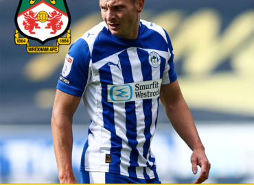 Paul Mullin Returns to Wrexham After Wigan Activate Break Clause